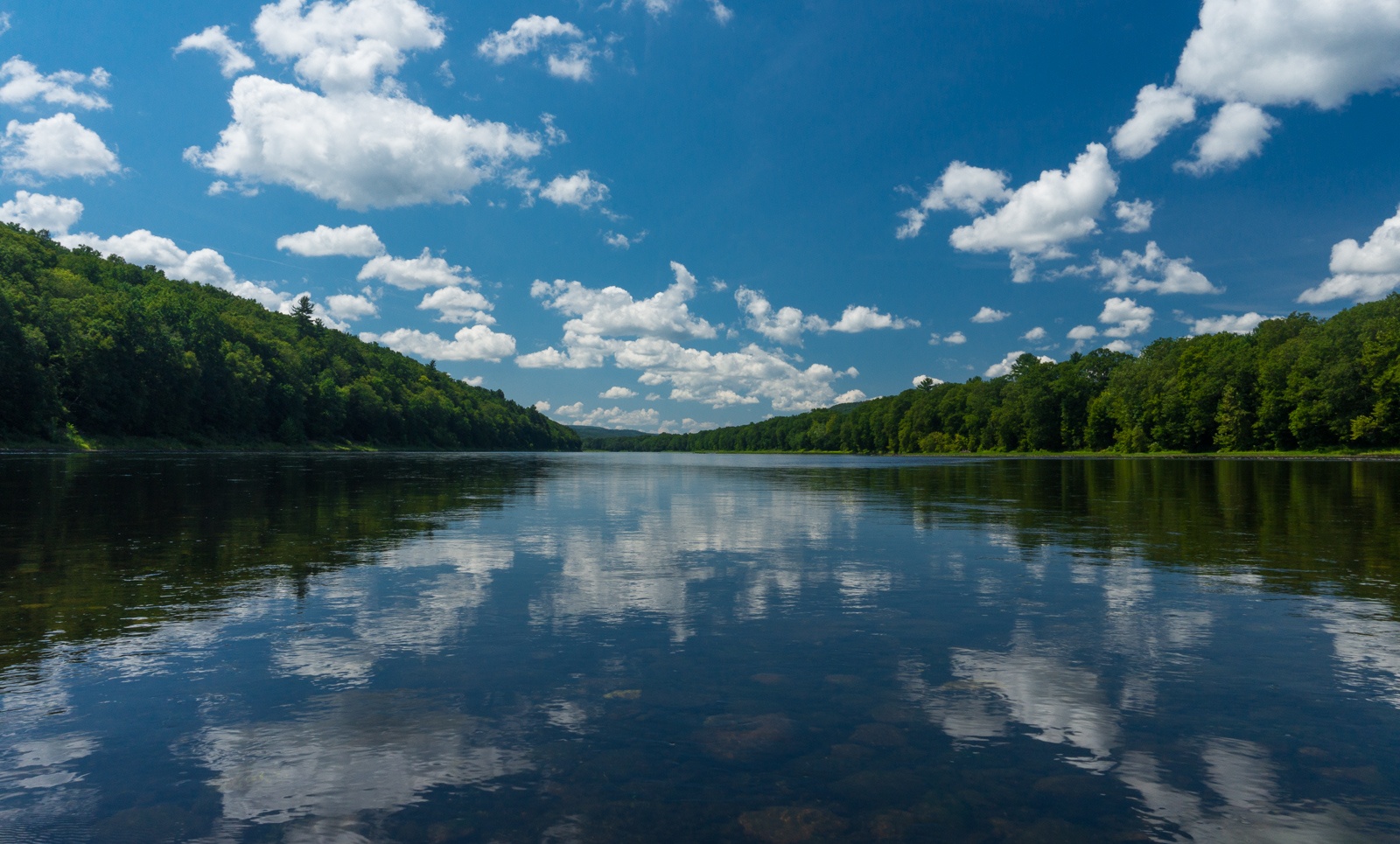 Stunning calm reflections of the bright blue sky.