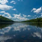 Stunning calm reflections of the bright blue sky.